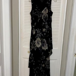 This is a Black/Grey Maxim Layer Dress. Size 12. In good condition .